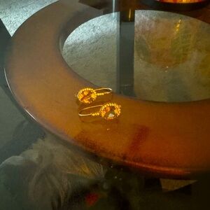 Moissanite Drop Earrings with peach stone surrounded by faux diamonds.